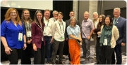 De izquierda a derecha: Margaret Lewis, Hannah Taboada, Myra Laird, John Sanders Krigbaum, Bernard Wood, Elisabeth Fillion, Chris Robinson, Denise Su, Terry Harrison, William Sanders, Susan Anton, Julia Arias-Martorell, Kieran P. McNulty